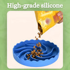 High-grade blue silicone pet feeder with food being poured into it.